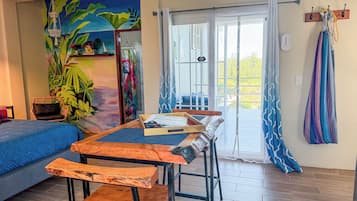Sunrise King Suite 360 degree views of island from roof top | Living area | 43-inch flat-screen TV with digital channels, Netflix