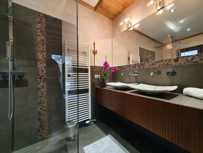 Shower, hair dryer, towels, soap