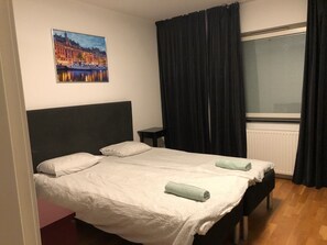 Huoneisto, 2 yhden hengen sänkyä | 1 makuuhuone, ilmainen Wi-Fi, vuodevaatteet