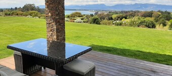 Beautiful new home with spectacular water and mountain views .