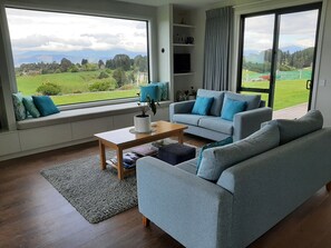 Living area - Beautiful new home with spectacular water and mountain views . (Redwood Valley)