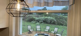 Remodeled country home in neighborhood with Amish farms, fire pit in back yard