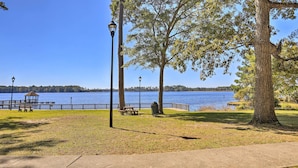 A park with a lake, benches, and a gazebo. - Convenient Jacksonville Home w/ Yard & Patio! (Jacksonville)