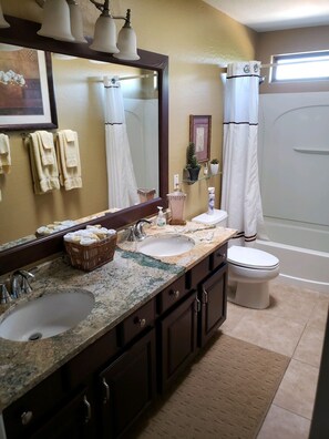 Combined shower/tub