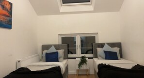 2 dormitorios, tabla de planchar con plancha, wifi y ropa de cama