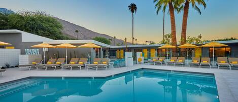 Outdoor pool, pool umbrellas, sun loungers