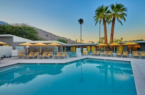 Outdoor pool, pool umbrellas, sun loungers