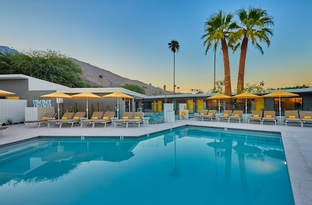 Outdoor pool, pool umbrellas, sun loungers