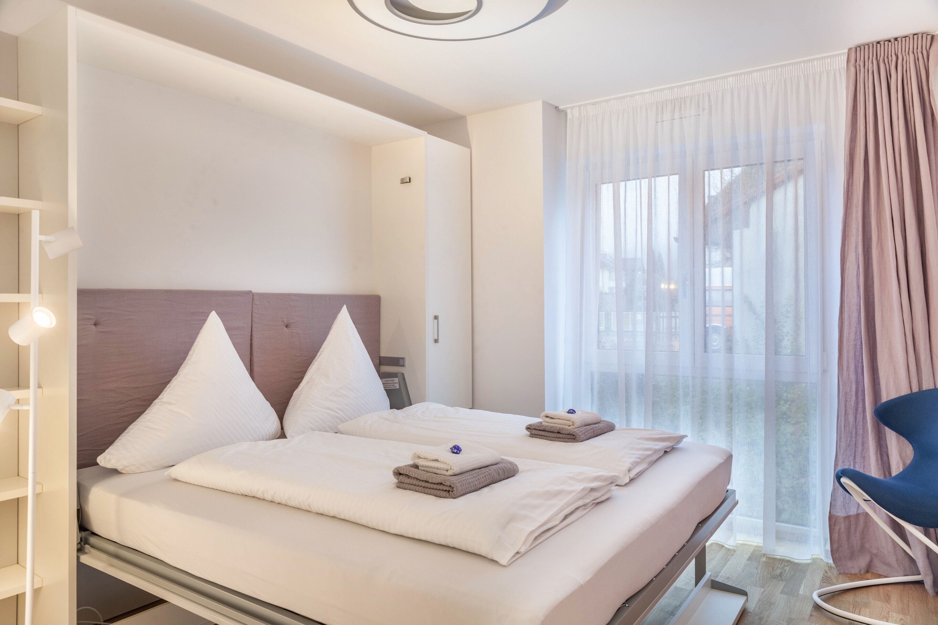 2 dormitorios, tabla de planchar con plancha, wifi gratis y ropa de cama