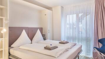 2 dormitorios, tabla de planchar con plancha, wifi gratis y ropa de cama