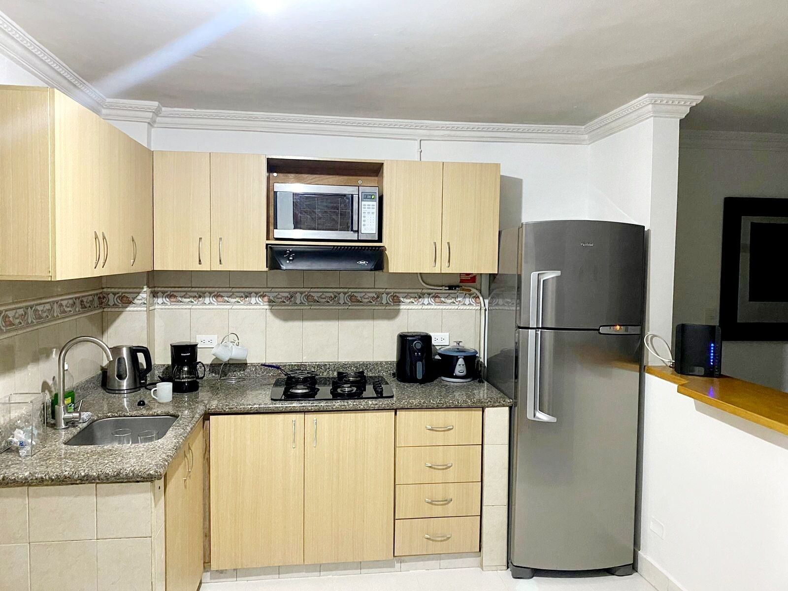 Microwave, stovetop, coffee/tea maker, electric kettle