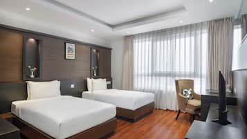 ห้องดีลักซ์ | เครื่องนอนระดับพรีเมียม, เตียงพร้อมฟูกเสริมที่นอน, มินิบาร์