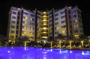 Outdoor pool, open 7:00 AM to 7:00 PM, pool umbrellas