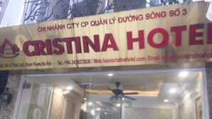 A hotel sign with the name "CRISTINA HOTEL" and contact information. - Cristina Boutique Hotel (Hanoi)