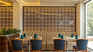 Breakfast, lunch, dinner served; local and international cuisine