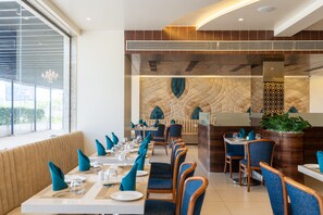 Breakfast, lunch, dinner served; local and international cuisine 