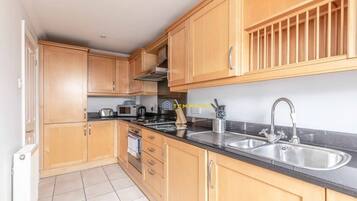 Réfrigérateur, four, plaque de cuisson, lave-vaisselle