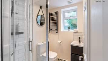 Bathtub, hair dryer, towels