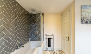 Bathtub, hair dryer, towels