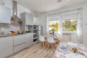 Family Apartment, Multiple Bedrooms (Pool And Garden Apartment Happy Sound) | 1 bedroom, free WiFi, bed sheets