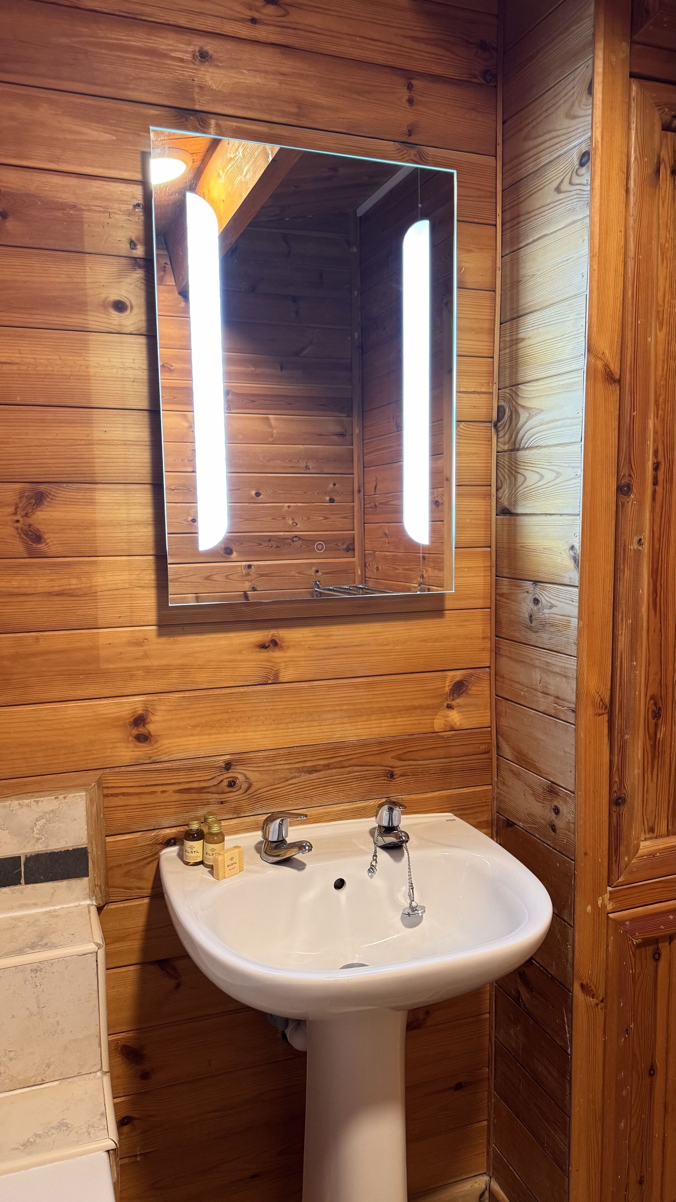 Bathtub, hair dryer, towels