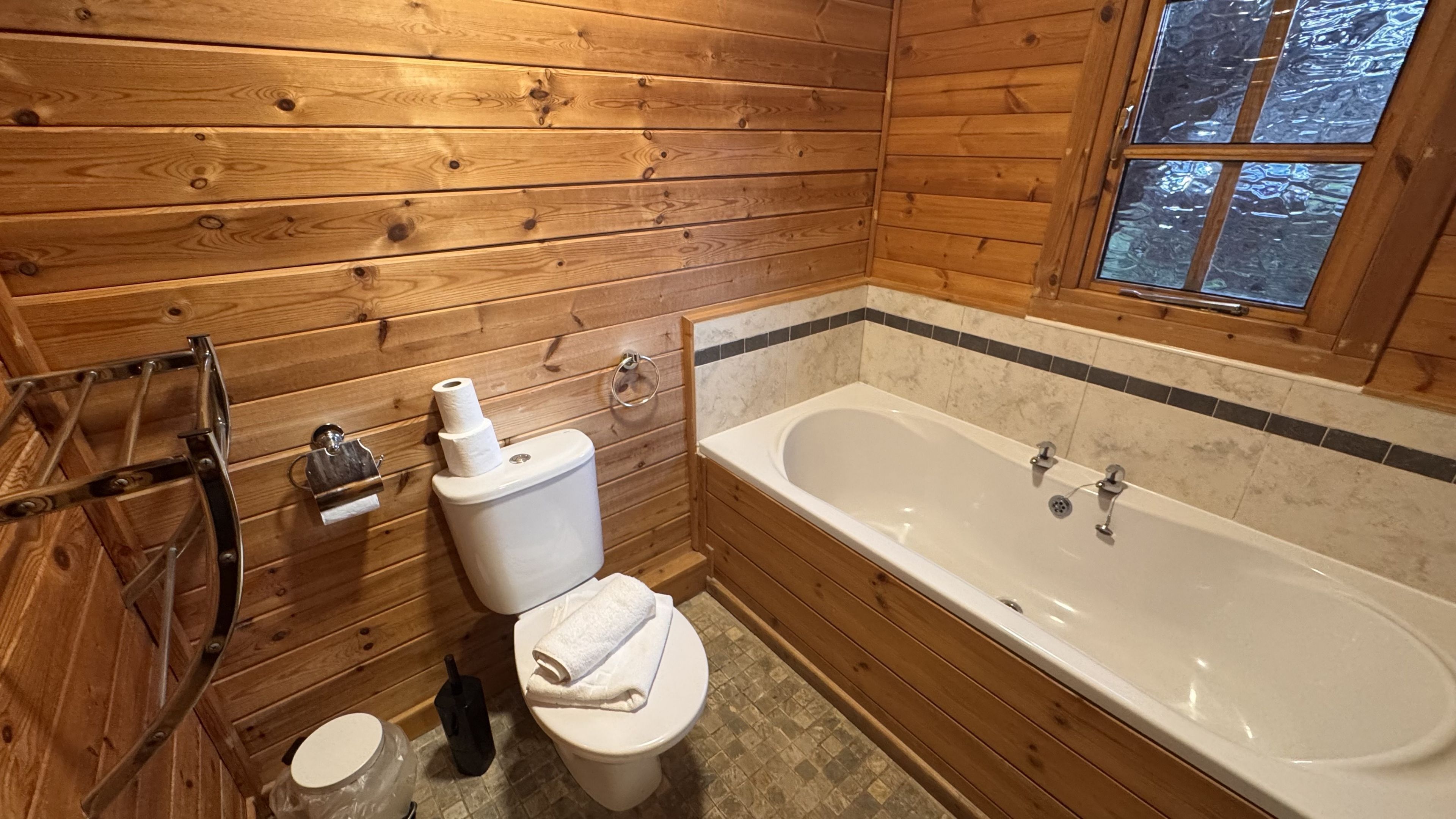 Bathtub, hair dryer, towels