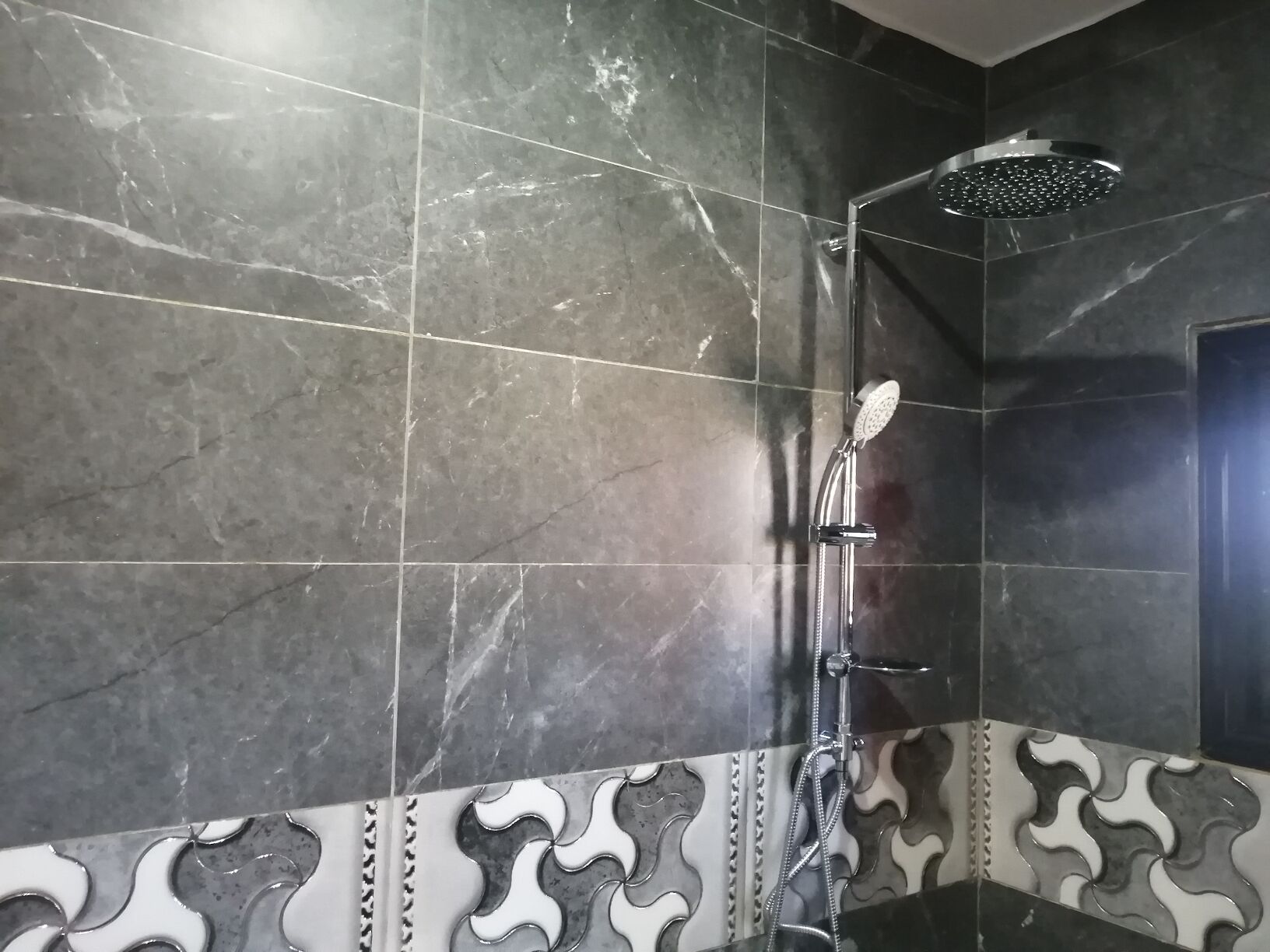 standard double room single use | bathroom | shower, rainfall showerhead, free toiletries, towels