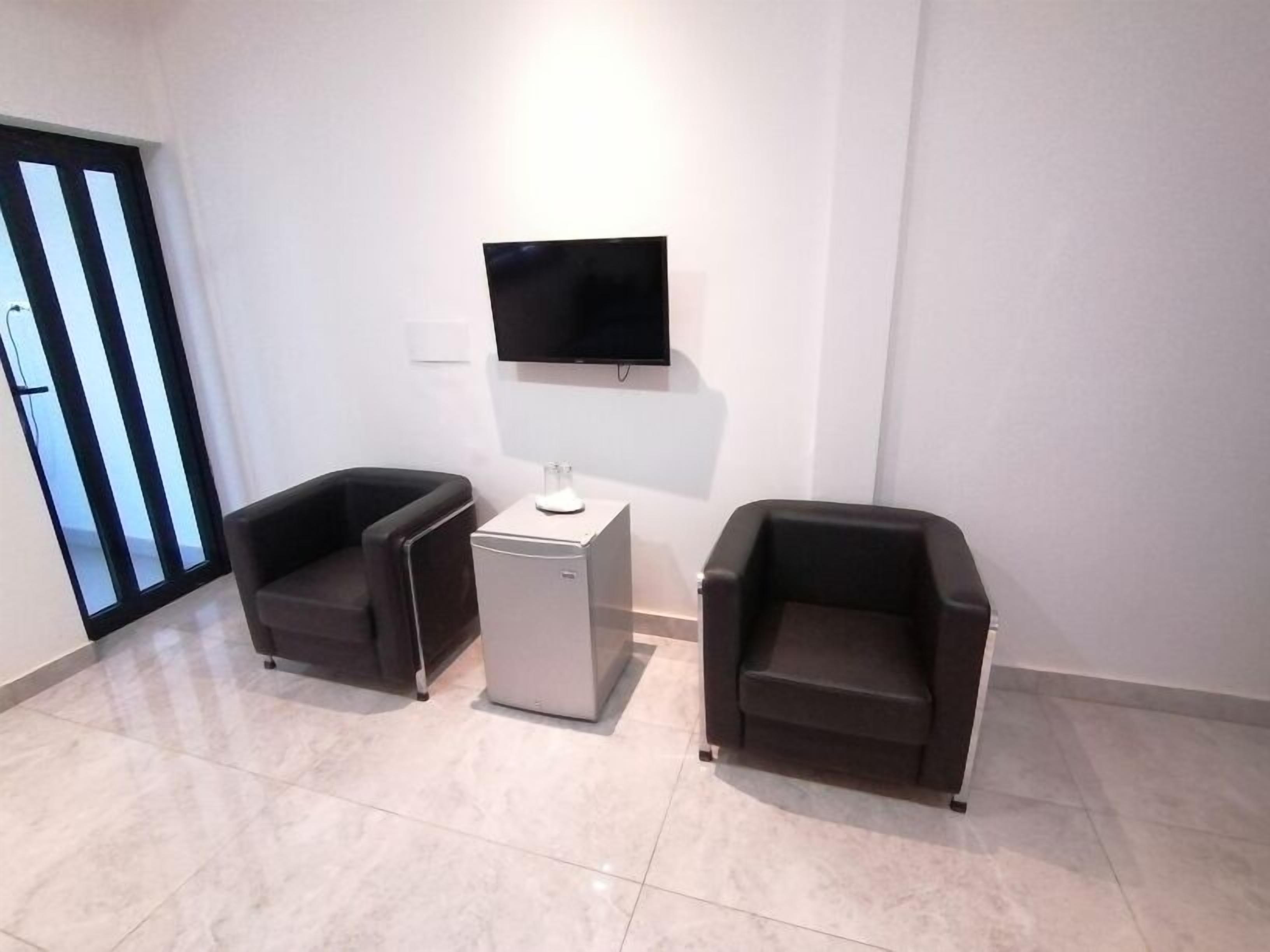 deluxe suite, balcony, garden view | 1 bedroom, down duvets, select comfort beds, minibar