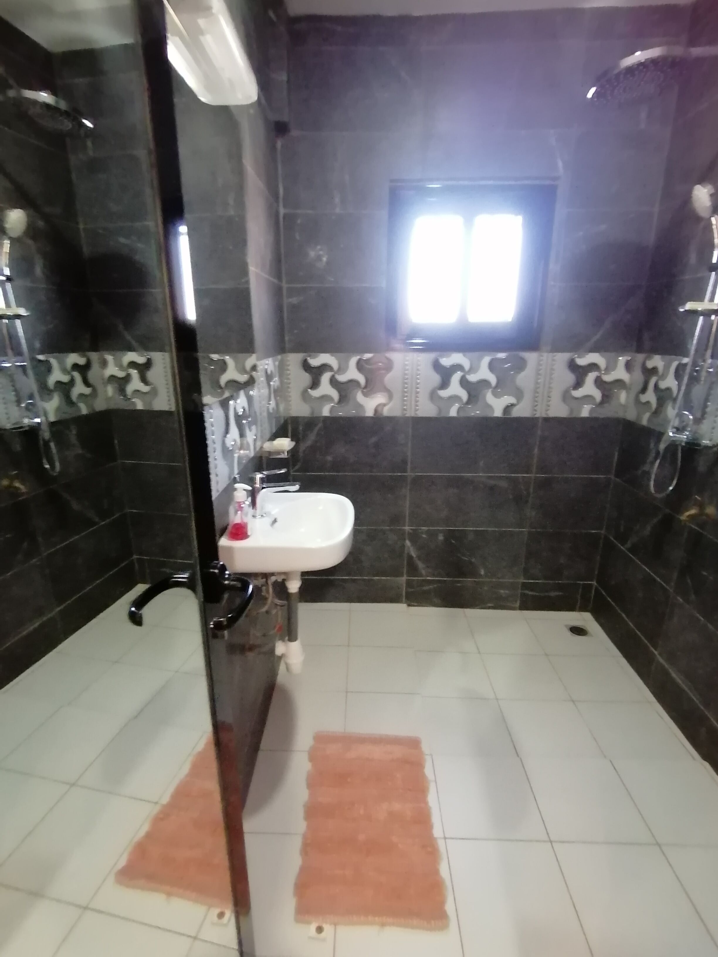 standard double room single use | bathroom | shower, rainfall showerhead, free toiletries, towels