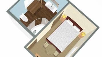 A two-room apartment layout with a bathroom, a bedroom, a small dining area, and a living space.