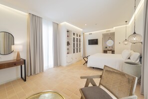 ห้องจูเนียร์สวีท, เตียงควีนไซส์ 1 เตียง | ผ้าปูที่นอนฝ้ายอียิปต์, เครื่องนอนระดับพรีเมียม, ผ้านวมขนเป็ด