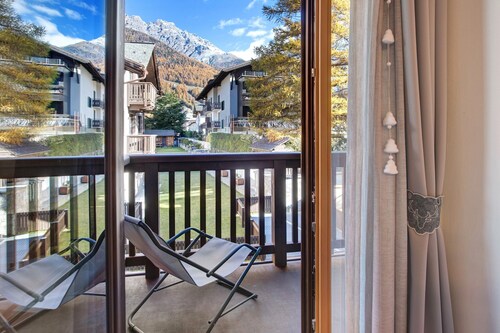 Apartment "Baita Emilia e Daniele 11" with Mountain Views, Balconies, and Wi-Fi