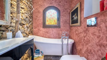 Bathtub, hair dryer, towels