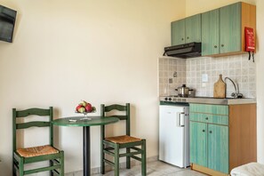 Fridge, stovetop, electric kettle, toaster