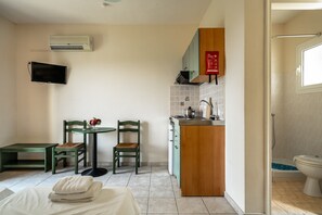 Fridge, stovetop, electric kettle, toaster