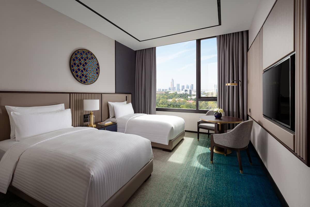 Premium bedding, memory foam beds, minibar, in-room safe