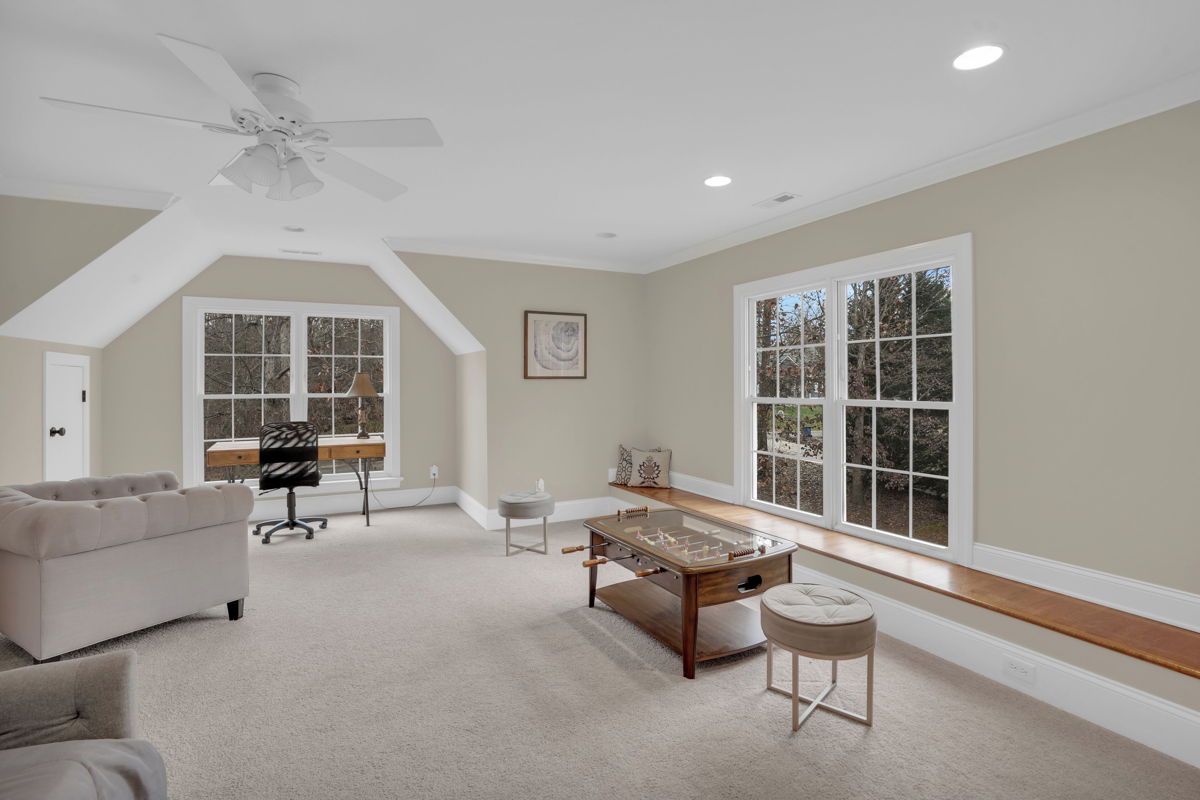 Spacious bonus room with natural light.