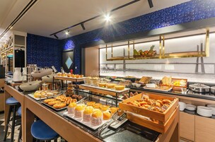 Daily buffet breakfast (EUR 18 per person)
