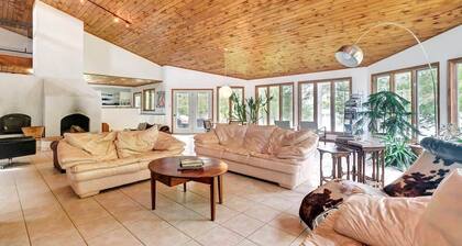 Stunning European waterfront escape with hot tub