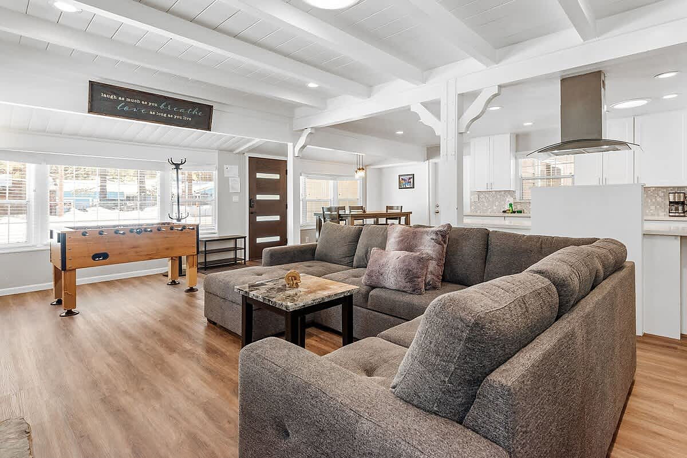 Bright living room with foosball table