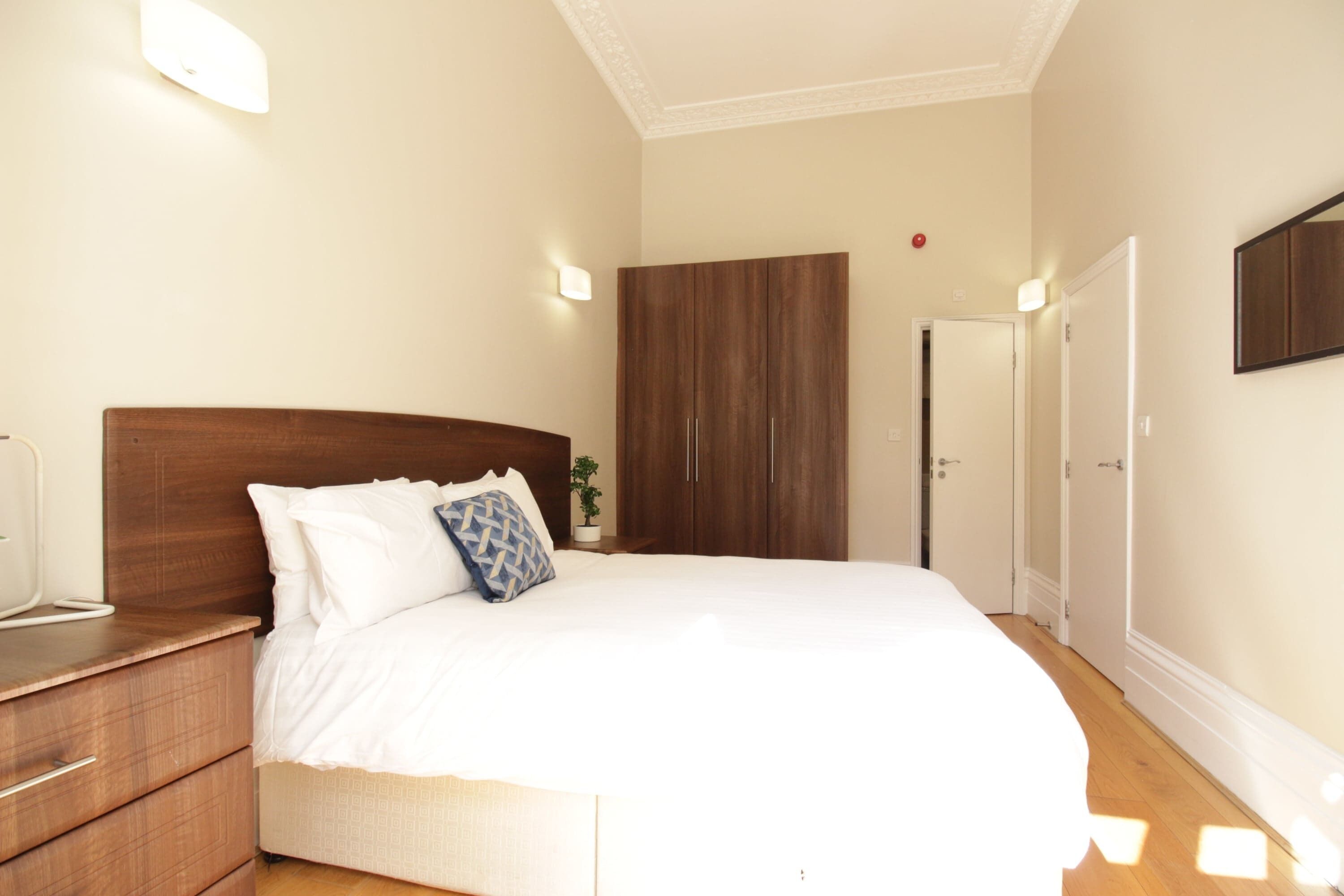 1 bedroom, desk, iron/ironing board, travel crib
