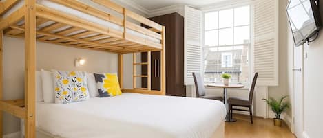 1 bedroom, desk, iron/ironing board, travel crib