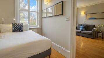 1 bedroom, desk, iron/ironing board, travel cot