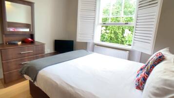 1 bedroom, desk, iron/ironing board, travel cot