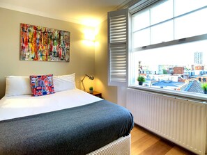 1 bedroom, desk, iron/ironing board, travel cot