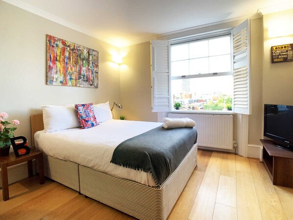 1 bedroom, desk, iron/ironing board, travel cot