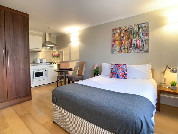 1 bedroom, desk, iron/ironing board, travel cot