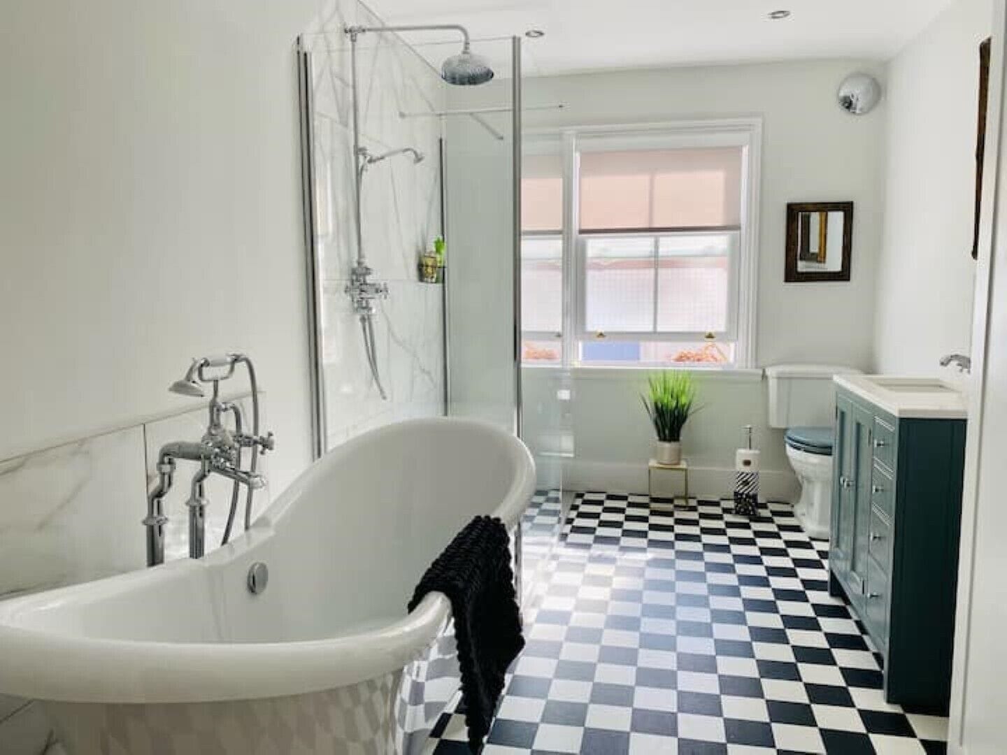 Bathtub, hair dryer, towels, soap