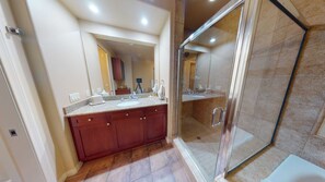 Bathtub, hair dryer, towels, soap
