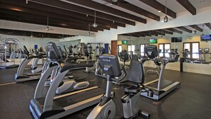 A gym with treadmills, elliptical machines, and weight equipment. - LV111 One Bedroom Legacy Villa Near Main Pool (La Quinta)